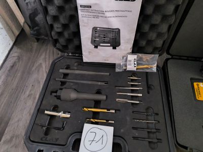 a case with tools in it sitting on a table