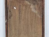 an old wooden box with a piece of paper sticking out of it