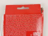 the back of a red box with a white sticker on it