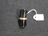 a small black object with a tag on it