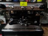 a coffee machine sitting on a counter in a kitchen