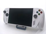 a white video game controller with a black screen