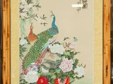 a picture of a painting of a peacock on a tree