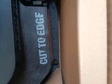 a close up of a box with a stapler attached to it