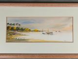aquarelle encadrée représentant des bateaux sur l'eau dans une baie