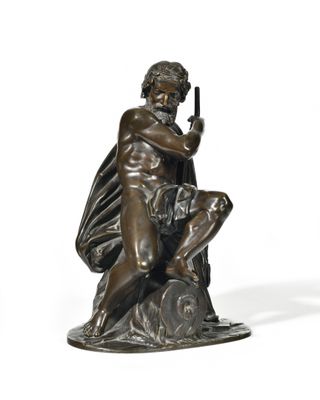 bronze statue of a man holding a gun on a white background
