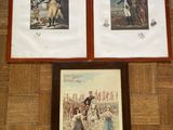 deux tableaux encadrés accrochés au mur d'une pièce