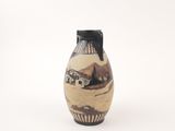 a black and white vase with a painting on it
