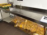 an image of a kitchen with a bunch of food on the counter