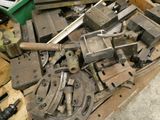a pile of old tools sitting on a table