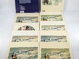 an open book with a picture of a man on a surfboard in the ocean