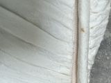 a close up view of a zipper on a mattress