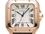 cartier tank watch with rose gold case and black leather strap