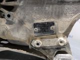 a close up of a motorcycle with a metal plate on it