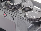 a close up of a camera with a lens attached to it