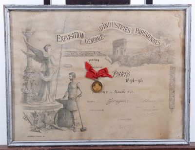 a picture of a framed picture with a red ribbon on it