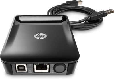 a close up of a small computer with a cable connected to it