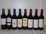 six bouteilles de vin sont alignées sur une table