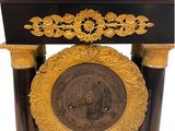 a clock that is sitting on top of a table