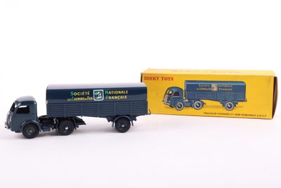 a toy truck with a box on the back of it