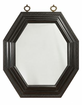 un miroir octogonal noir avec un cadre en métal et un crochet en métal