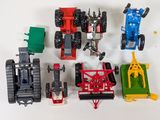 a lot of toy vehicles that are sitting on a table