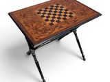 an image of a table with a chess board on top of it