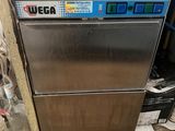 an image of a stainless steel dishwasher in the corner of a kitchen