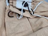 a close up of a pair of pants with a pair of scissors on it