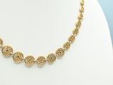 a gold necklace on a mannequin mannequin mannequin mannequin mannequin mannequin mannequin mannequin mannequin