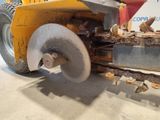 a picture of a machine that has been used to cut wood