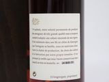 a label on a bottle of wine on a table