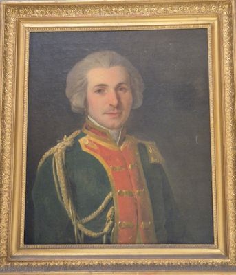 portrait d'un homme en uniforme militaire dans un cadre doré