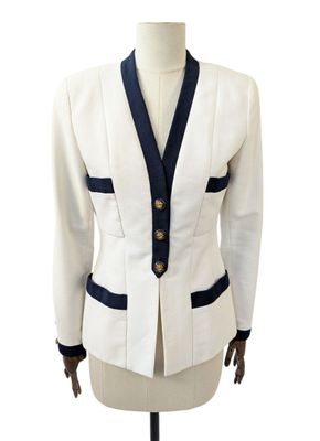 a picture of a white jacket with blue trimmings