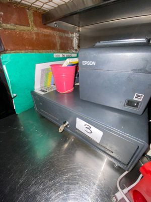 an image of a kitchen with a metal counter top