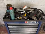 a tool box full of tools on the floor