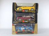 three toy cars that are sitting on top of each other