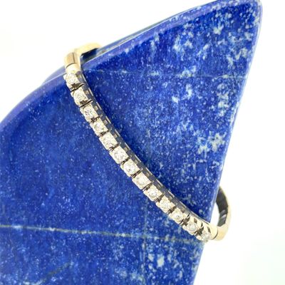 an image of a blue stone with a diamond ring on it