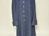 the coat is blue and has gold buttons on it