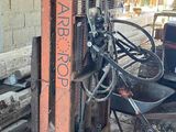 an image of a machine that is sitting in the dirt