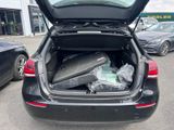 a trunk of a car with luggage in it