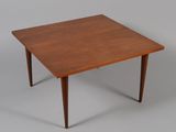 an image of a small table with a wooden top and legs