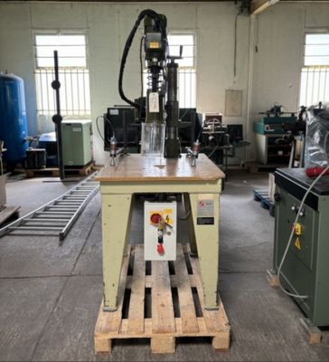 a machine that is sitting on a pallet in a building