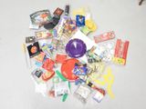 a pile of candy, candy bars, and other candy items on the floor