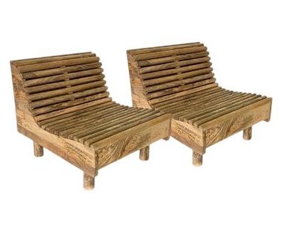 pair of wooden chaise loungers with slats on each side