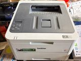 a printer that is sitting on top of a pile of boxes