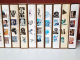 a lot of books that are sitting on a table