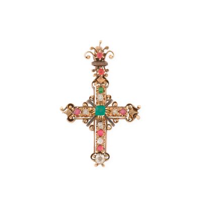 un gros plan d'une croix sur fond blanc