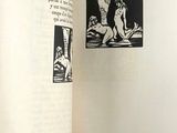 an open book with a picture of a woman on it