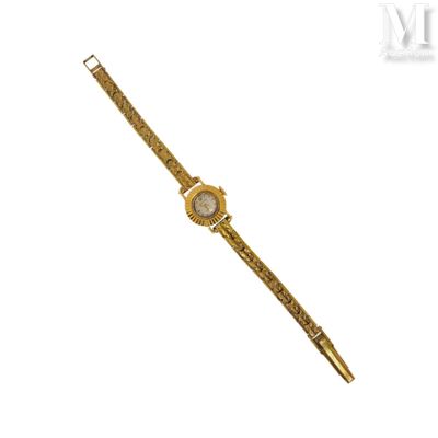 une image d'une montre-bracelet en or avec un cadran blanc